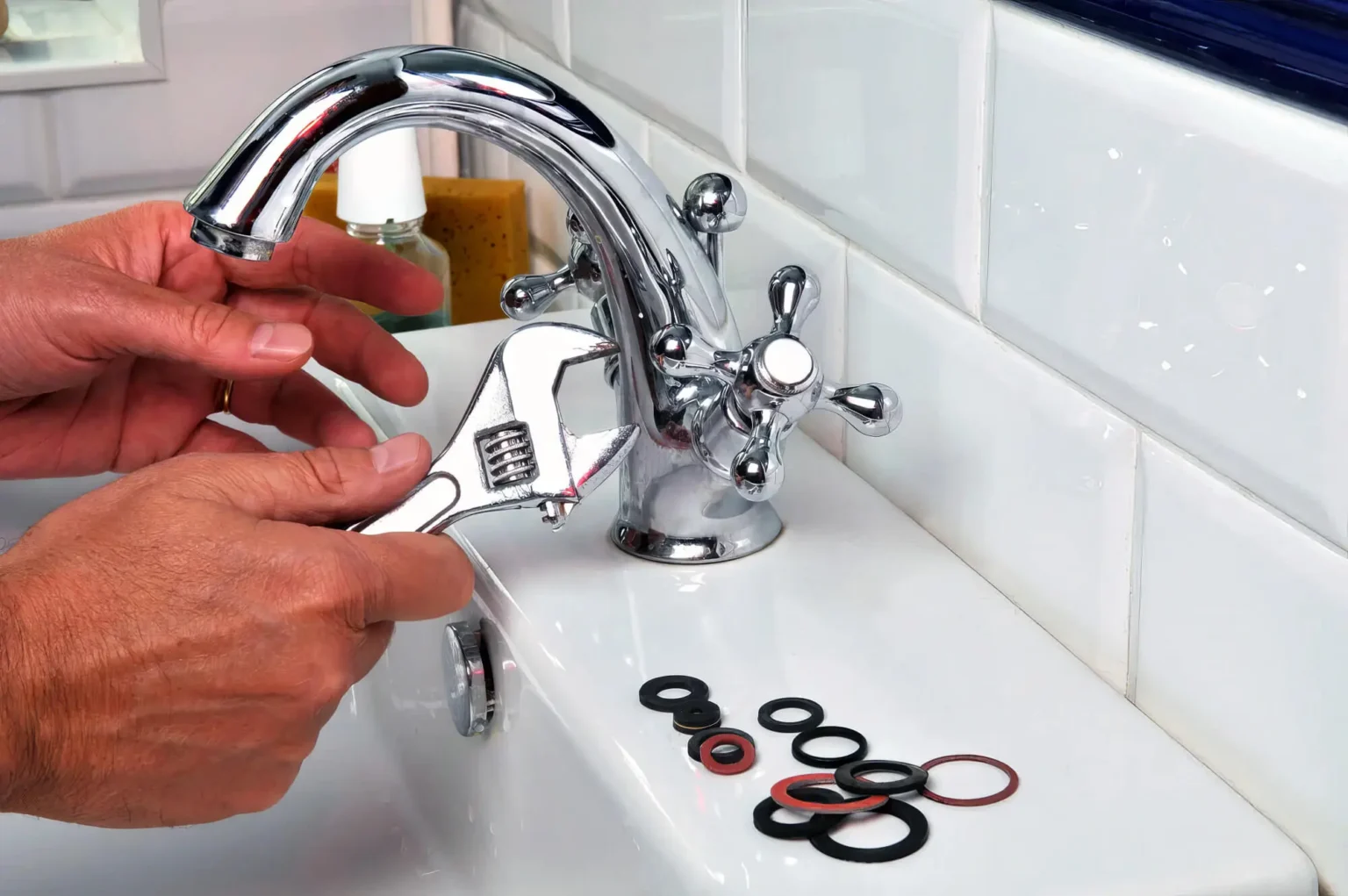 Plumber maintaining a bathroom faucet in Torrance